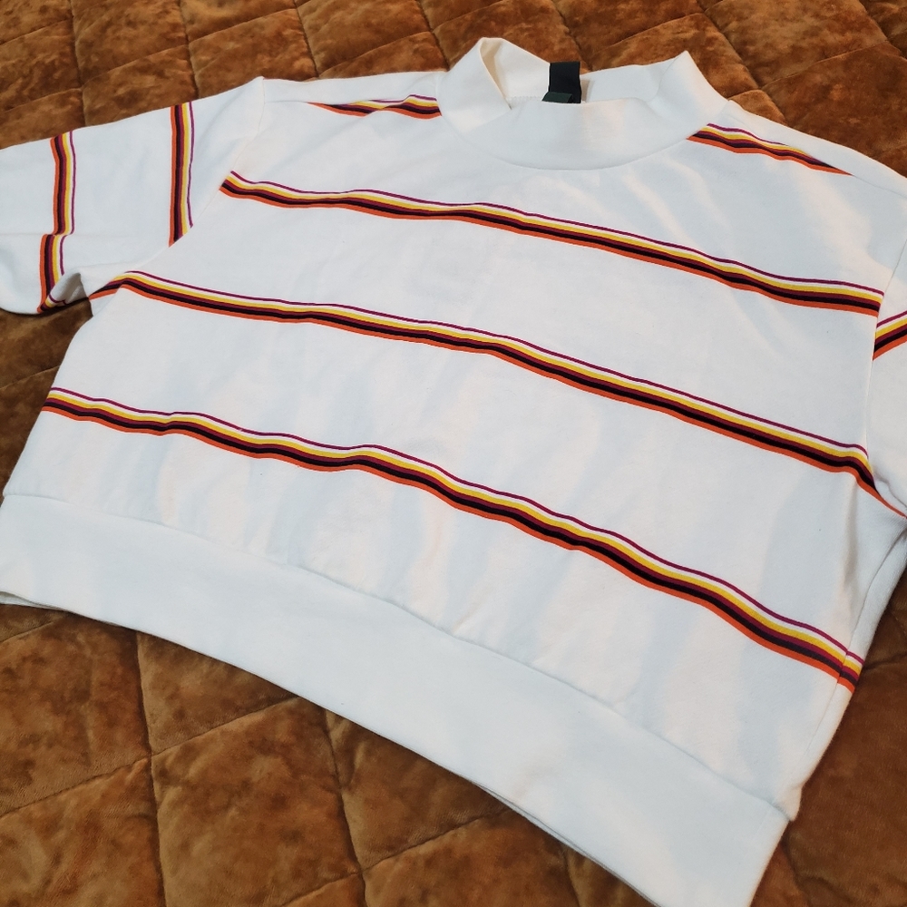 White long-sleeved mock neck crop sweater